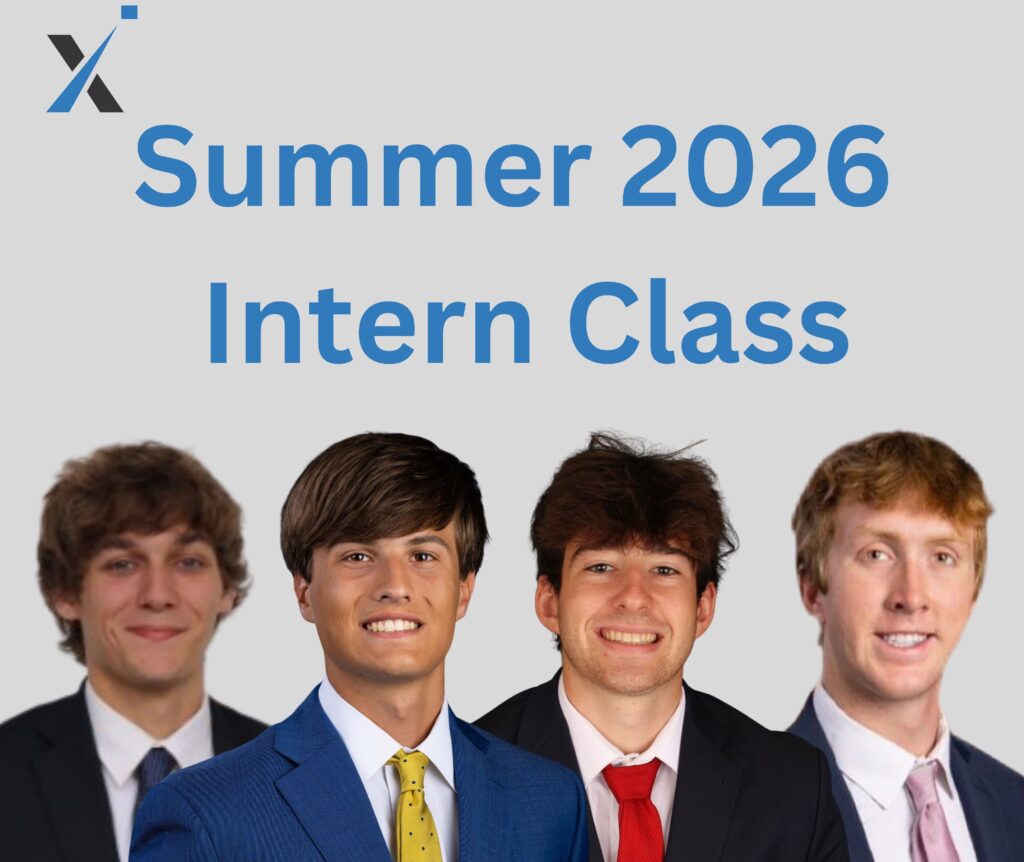 Four young men in suits stand smiling in front of a gray background with the text Summer 2026 Intern Class above them in blue letters. A small abstract logo appears in the top left corner.