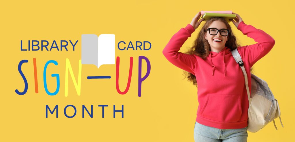 A smiling young woman in a red hoodie and glasses holds a book on her head against a yellow background. Text reads: Library Card Sign-Up Month with colorful, playful letters and an open book graphic.
