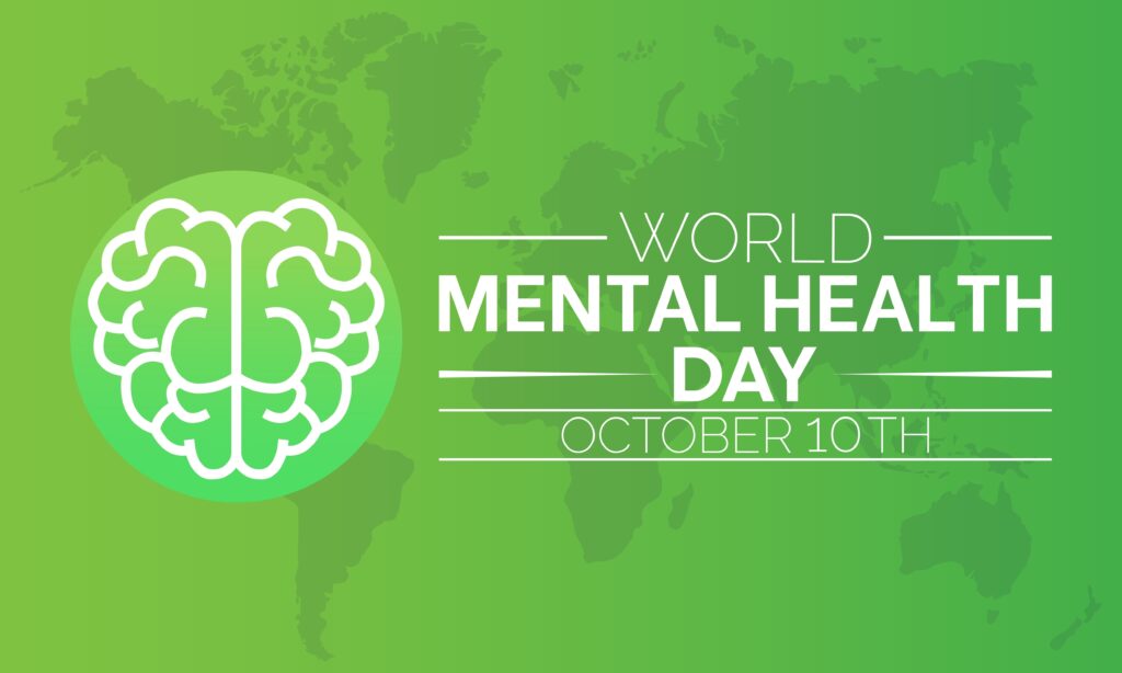 Green graphic with an outline of a brain on the left and text on the right that reads: World Mental Health Day, October 10th, over a faint world map background.