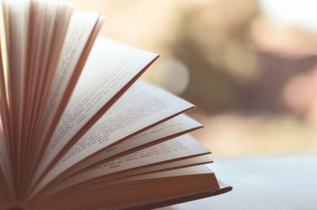 picture of open book with pages turning
